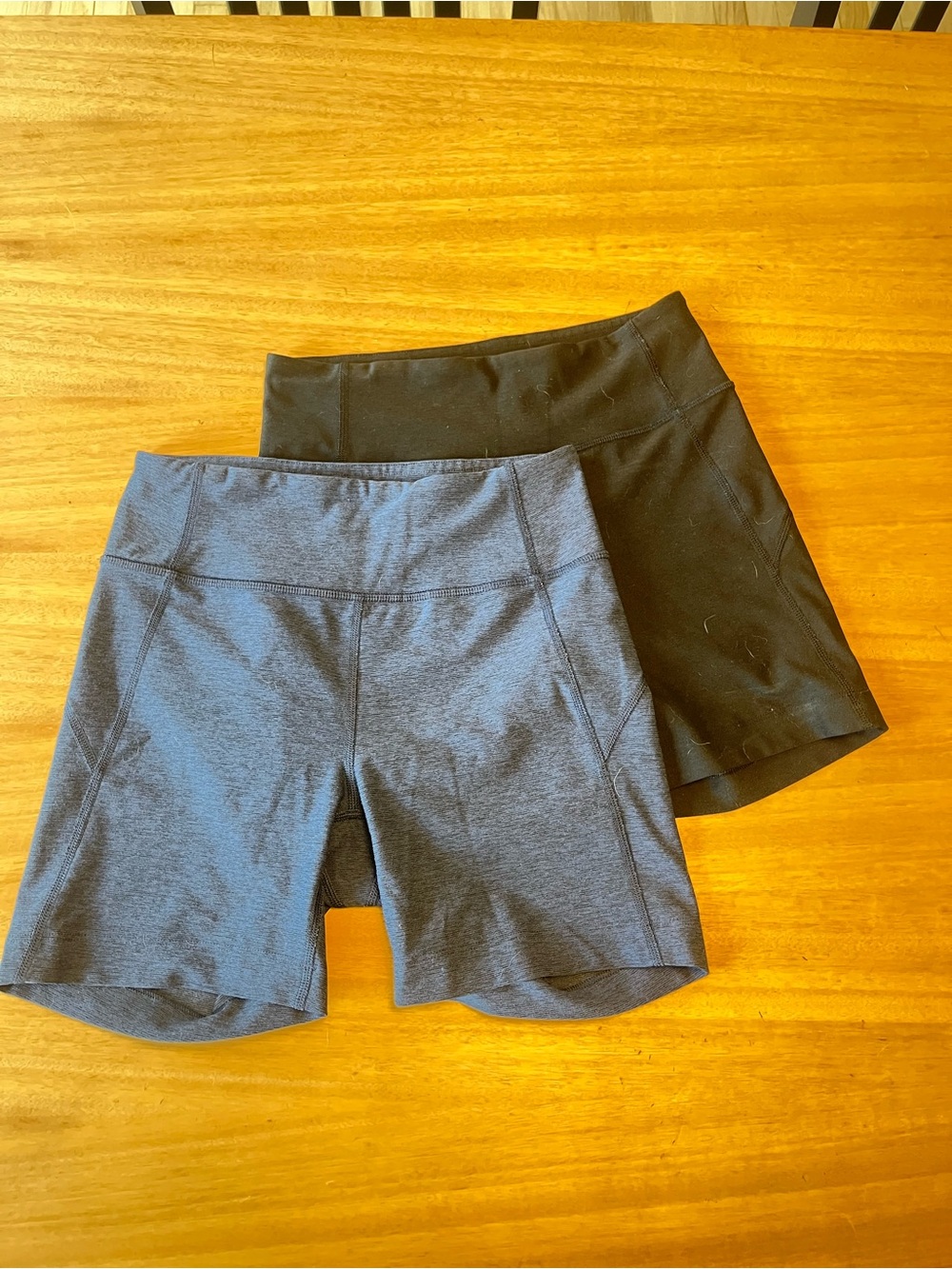 Outdoor Voices Women’s Biker Shorts in Black and Heather Blue